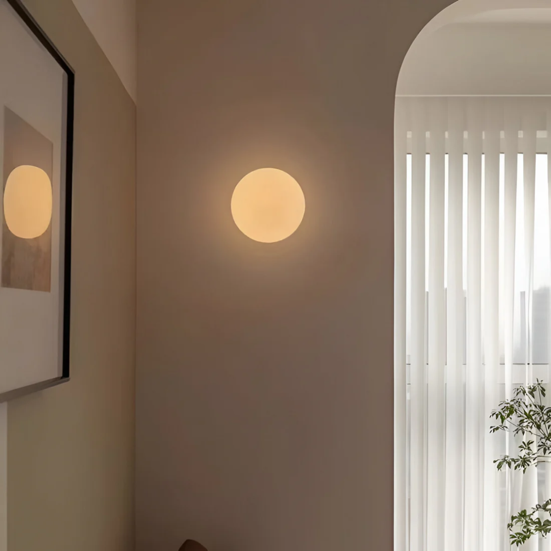 Aplique de Parede em Vidro – Elegância e Luz Sutil 