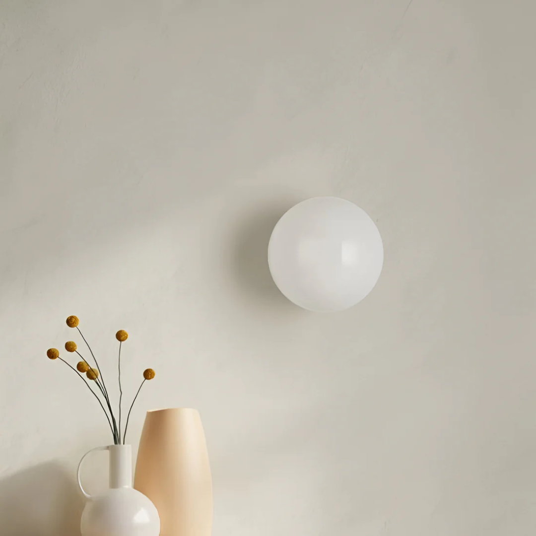 Aplique de Parede em Vidro – Elegância e Luz Sutil 