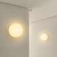 Aplique de Parede em Vidro – Elegância e Luz Sutil 