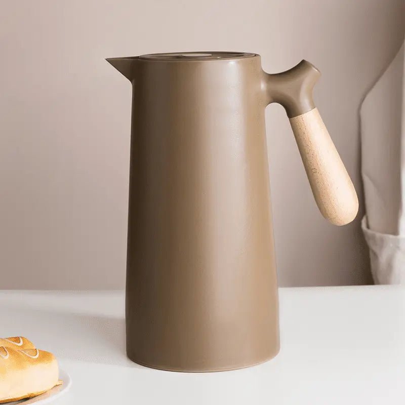 Carafă izotermă cu mânere – Conservare pe termen lung și design elegant 
