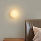 Aplique de Parede em Vidro – Elegância e Luz Sutil 